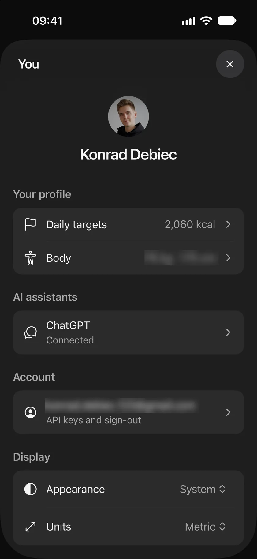 The You sheet: your name and picture, Your profile with Daily targets and Body, AI assistants with ChatGPT connected, your account, and Display with Appearance and Units.